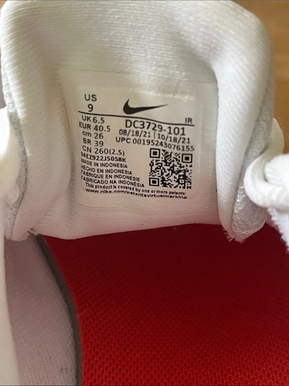 Nike Women’s White Sneakers with Silver Swoosh